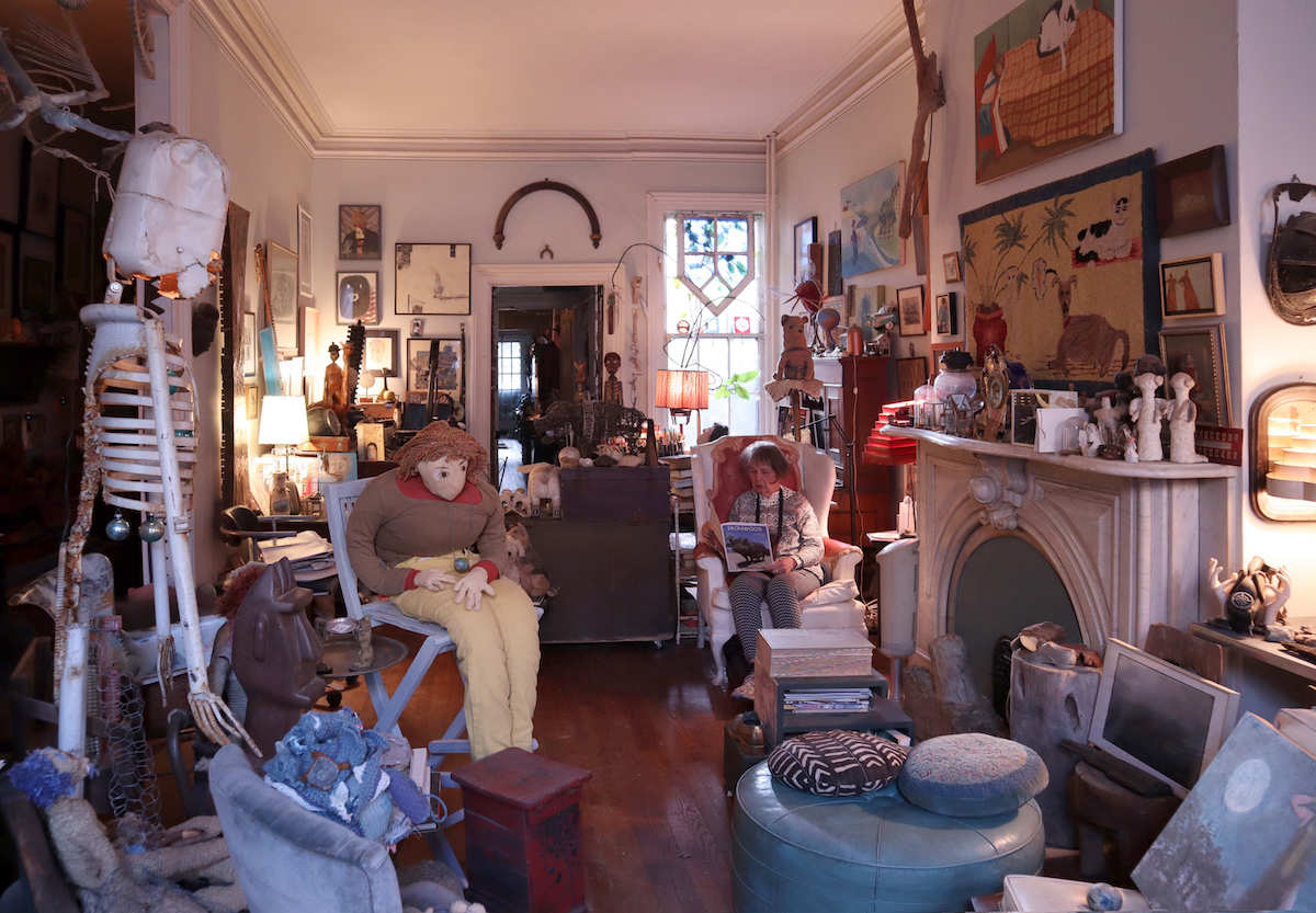 Artist Linda Franklin in her Bolton Hill home surrounded by her art